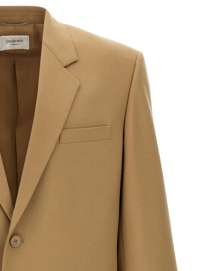 This Blazer by Saint Laurent for men in wool beige presents a tailored silhouette, meticulously tailored with a tailored and distinctive for a tailored finish.