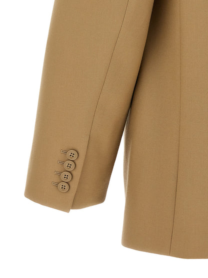 This Blazer by Saint Laurent for men in wool beige presents a tailored silhouette, meticulously tailored with a tailored and distinctive for a tailored finish.