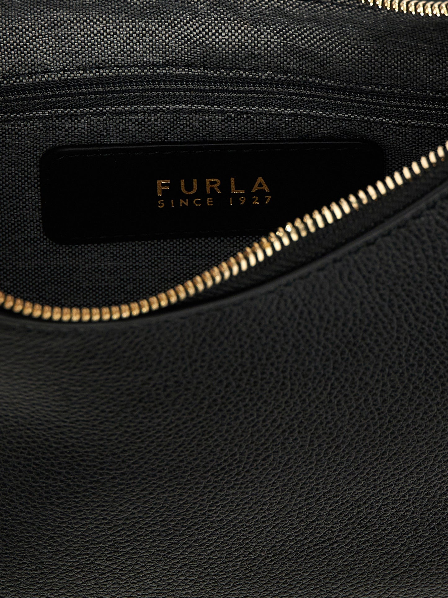 Evening Shoulder Bag by Furla for women in leather black features a effortless chic silhouette with a secure zipper, ample , and versatile shoulder-strap, handle & adjustable-strap for a effortless chic finish.