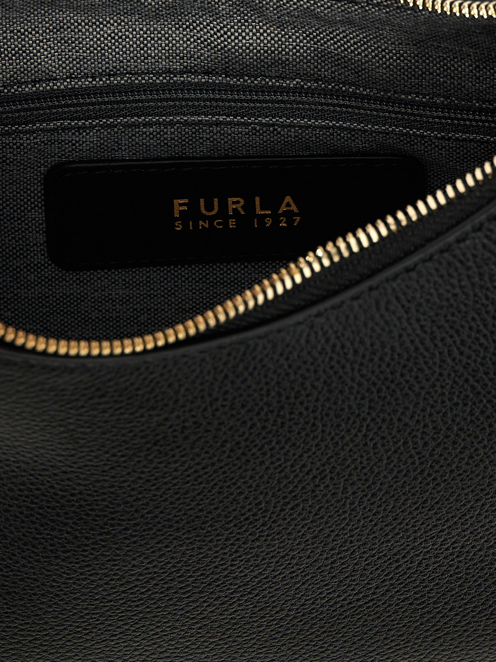 Evening Shoulder Bag by Furla for women in leather black features a effortless chic silhouette with a secure zipper, ample , and versatile shoulder-strap, handle & adjustable-strap for a effortless chic finish.
