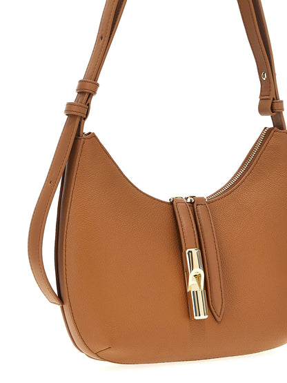 Shoulder Bag by Furla for women in leather brown showcases a statuesque silhouette, artfully detailed with a secure zipper, organized , and versatile shoulder-strap & adjustable-strap for a statuesque look.