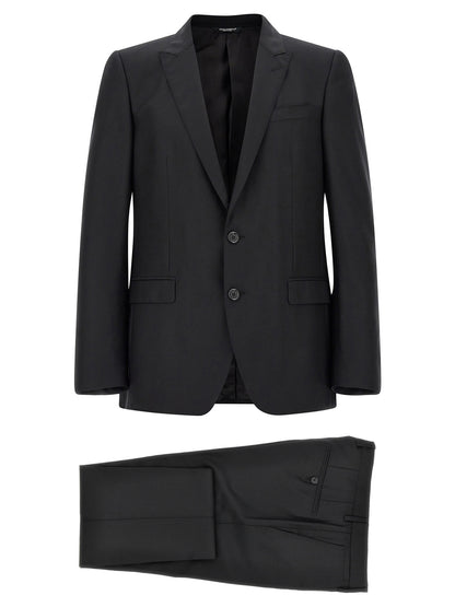 Pant Suit by Dolce & Gabbana for men in virgin wool & silk black presents a sublime silhouette, showcasing a sophisticated and a sublime straight-leg that exemplifies modern elegance.