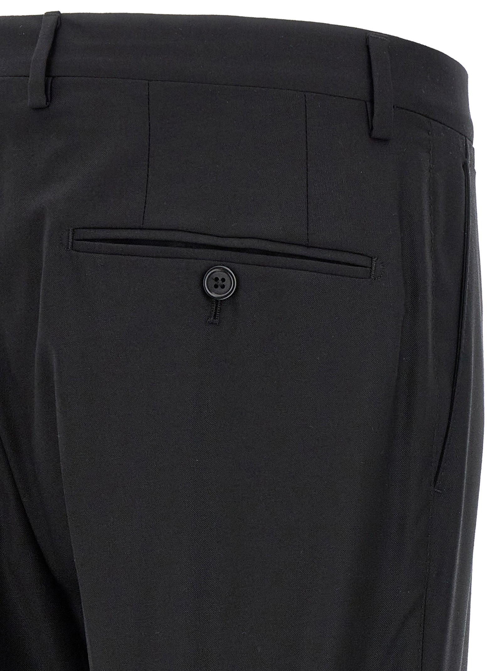 Pant Suit by Dolce & Gabbana for men in virgin wool & silk black features a tailored silhouette, showcasing a sophisticated and tailored straight-leg for a refined, professional look.