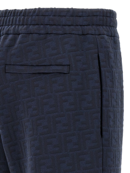 Joggers by Fendi for men in cotton polyester blue, jacquard & monogram features a refined silhouette with a refined straight, defined by a and a refined long for a refined finish.