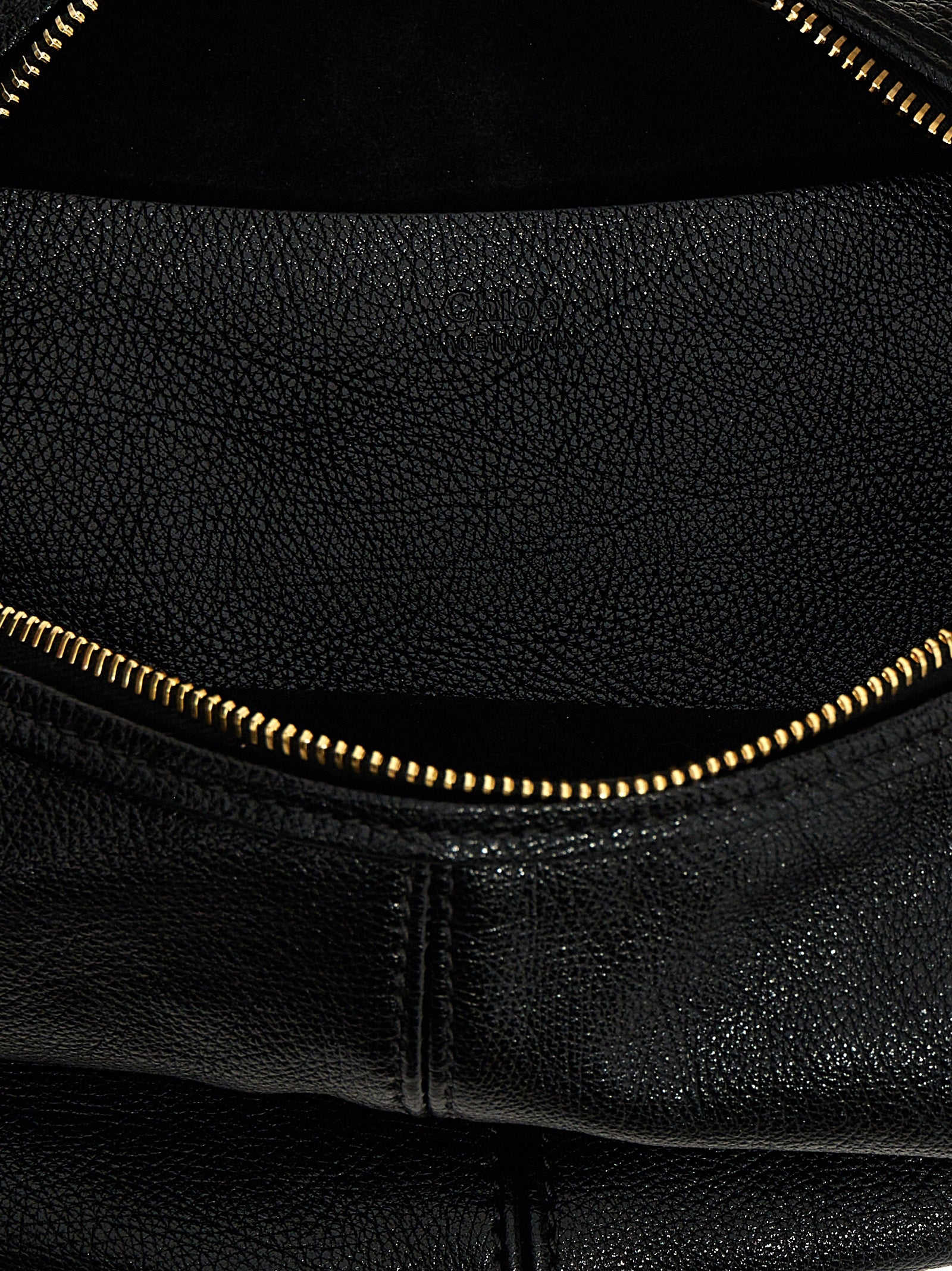 Hobo Handbag by Chloé for women in calfskin leather black presents a ornamental silhouette, showcasing a secure zipper, ample , and versatile shoulder-strap, adjustable-strap, detachable-strap & handle for a ornamental finish.