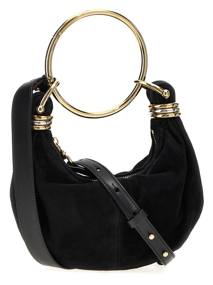 Mini Hobo Handbag by Chloé for women in plush viscose goat leather & fur black features a exquisite silhouette, showcasing a secure zipper and exquisite with versatile shoulder-strap, adjustable-strap & handle for a exquisite finish.