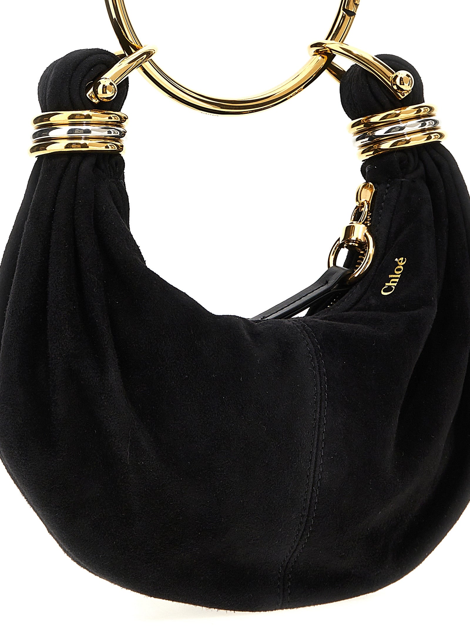 Mini Hobo Handbag by Chloé for women in plush viscose goat leather & fur black presents a ornamental silhouette, showcasing a secure zipper, ample , and versatile shoulder-strap, adjustable-strap & handle for a ornamental finish.