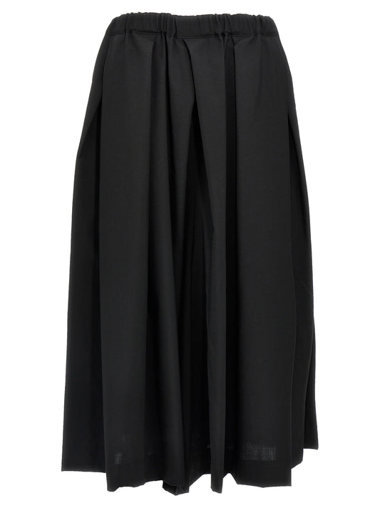 Skirt by Comme Des Garçons for women in wool black showcases a dramatic silhouette, artfully capturing the essence of the Women's Wool Skirt in a dramatic midi cut for a refined look.