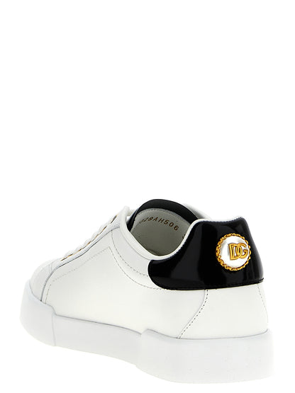 Sneakers by Dolce & Gabbana for women in calfskin leather bicolour, black, pearl & white features an versatile design from the Women's Low Top Calfskin Leather Sneakers collection, highlighting a versatile low-top style for a premium, high-fashion look.