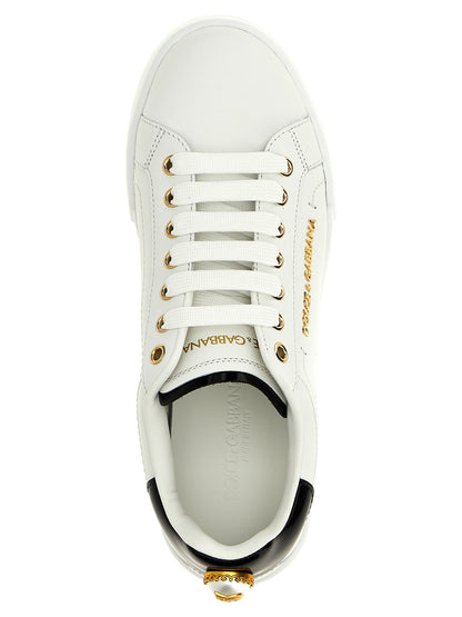 Sneakers by Dolce & Gabbana for women in calfskin leather bicolour, black, pearl & white presents a sumptuous silhouette, artfully capturing the essence of the Women's Low Top Calfskin Leather Sneakers with its sumptuous low-top style design.