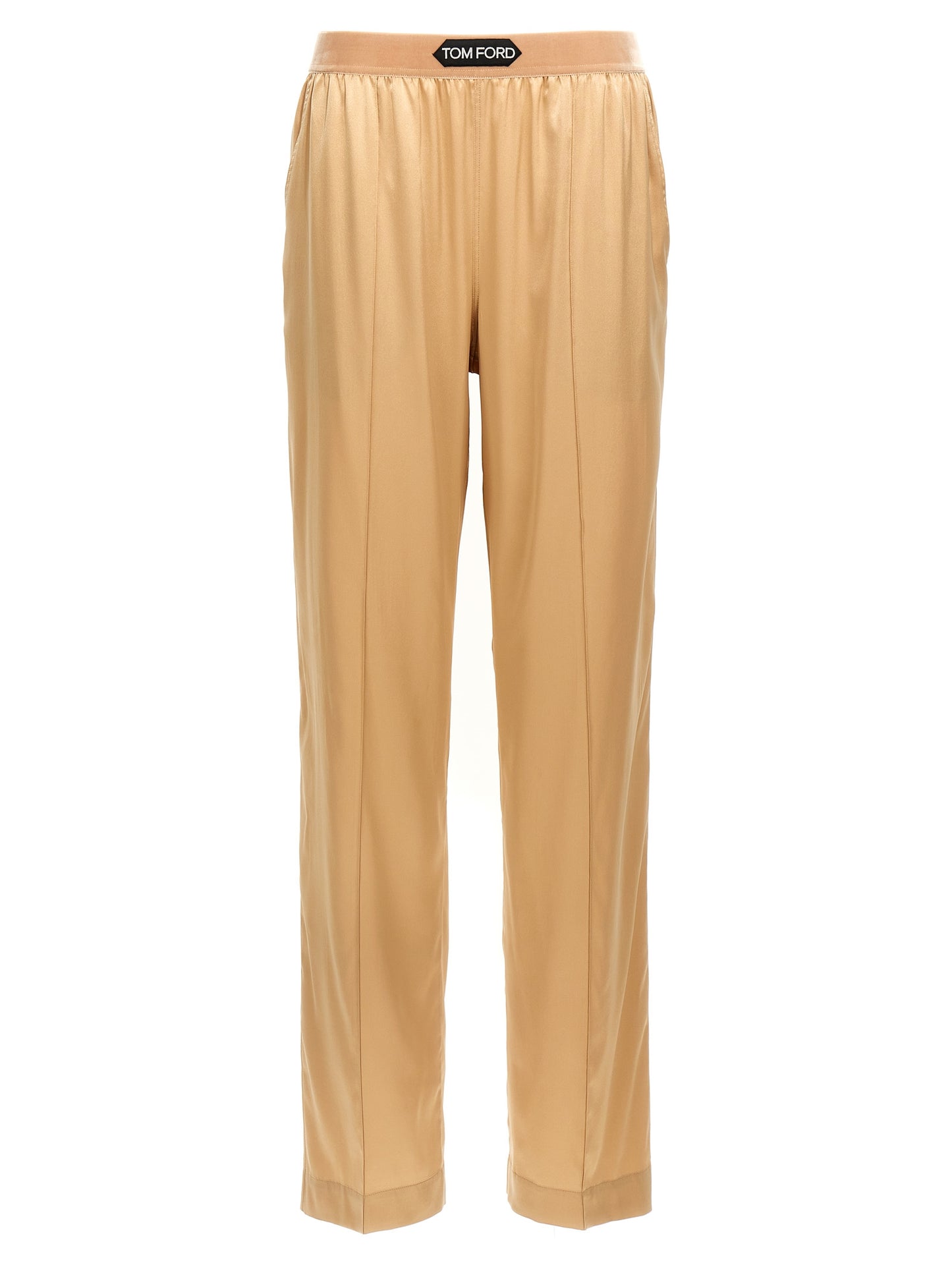 Trousers by Tom Ford for women in silk velvet beige presents a perennial silhouette, meticulously tailored with a straight-leg cut, long finish, and an elegant .