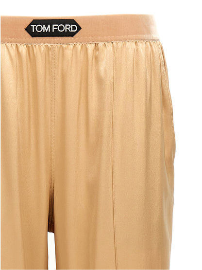 Trousers by Tom Ford for women in silk velvet beige features an on trend silhouette, showcasing a sophisticated straight-leg with a long and for an on trend finish.