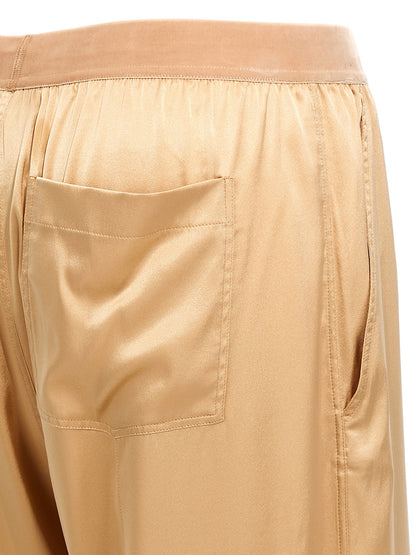 Trousers by Tom Ford for women in silk velvet beige features a sculptural silhouette, showcasing a sculptural straight-leg and long with a sophisticated for a sculptural finish.