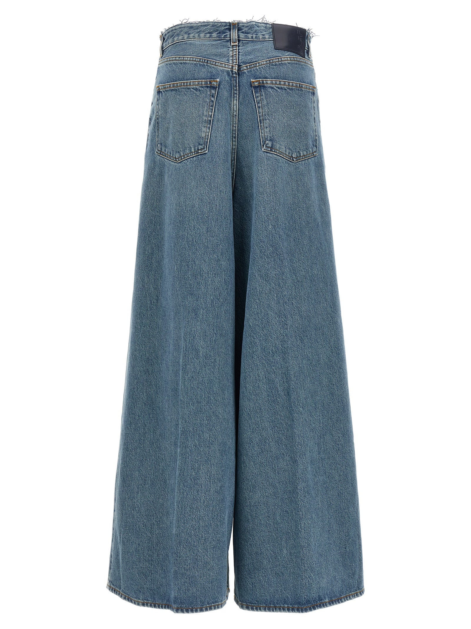 Jeans by Haikure for women in denim cotton blue features a polished silhouette with a polished relaxed-fit & wide, reaching a polished long and finished with a polished .