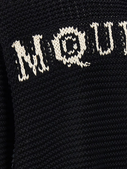 Cardigan by Alexander McQueen for men in cotton bicolour, black & white showcases a captivating silhouette, artfully detailed with a captivating and for a truly sophisticated captivating look.