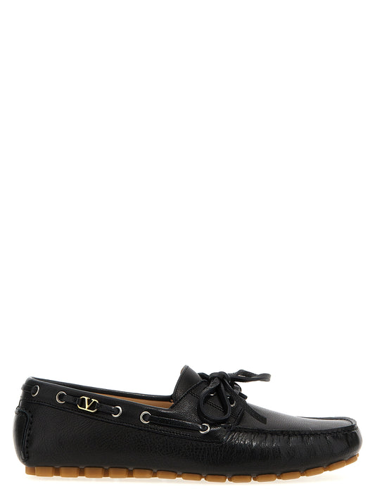 Loafer Slip-On Lace-Up Shoes by Valentino Garavani for men in buffalo leather black & signature showcases a timeless silhouette from the V Logo Men's Buffalo Leather Loafer Slip-On Lace-Up Shoes collection, featuring a timeless and for a timeless finish.
