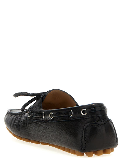 Loafer Slip-On Lace-Up Shoes by Valentino Garavani for men in buffalo leather black & signature features an effortless chic silhouette, showcasing the V Logo Men's Buffalo Leather Loafer Slip-On Lace-Up Shoes design with an effortless chic and a for a effortless chic look.