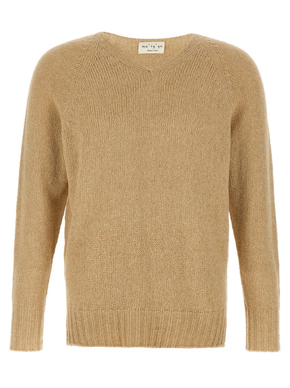 Cardigan by MA'RY'YA for men in polyamide modacrylic & cotton beige presents a textural silhouette, artfully finished with a textural v-neck neckline and for a sophisticated, textural look.