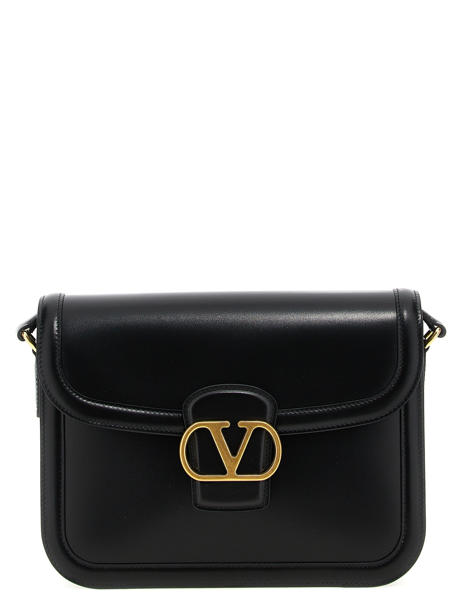 Shoulder Evening Saddle Bag by Valentino Garavani for men in bos taurus suede calfskin leather black & signature features a distinguished silhouette, showcasing a secure flap, magnetic & buckle and distinguished with versatile shoulder-strap & adjustable-strap for a distinguished finish.