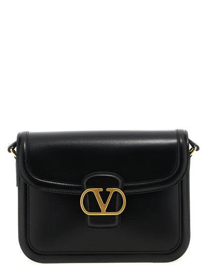 Shoulder Evening Saddle Bag by Valentino Garavani for men in bos taurus suede calfskin leather black & signature features a distinguished silhouette, showcasing a secure flap, magnetic & buckle and distinguished with versatile shoulder-strap & adjustable-strap for a distinguished finish.
