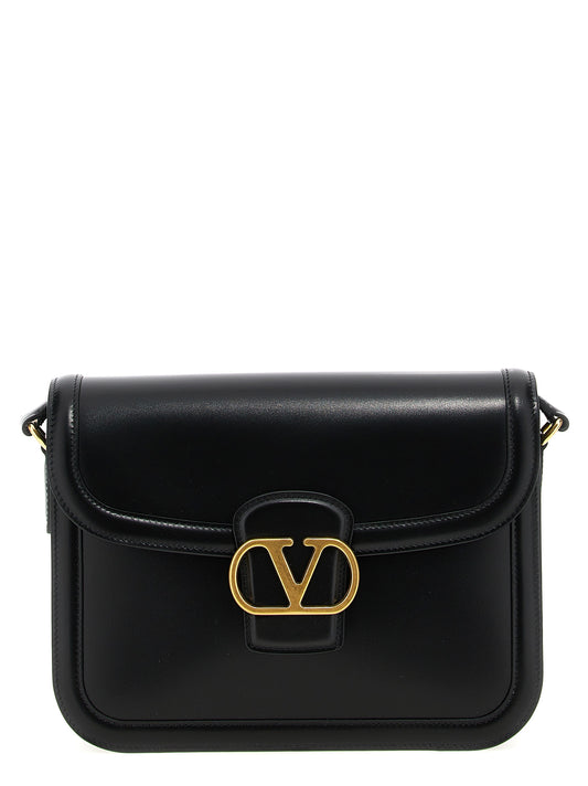 Shoulder Evening Saddle Bag by Valentino Garavani for men in bos taurus suede calfskin leather black & signature features a distinguished silhouette, showcasing a secure flap, magnetic & buckle and distinguished with versatile shoulder-strap & adjustable-strap for a distinguished finish.