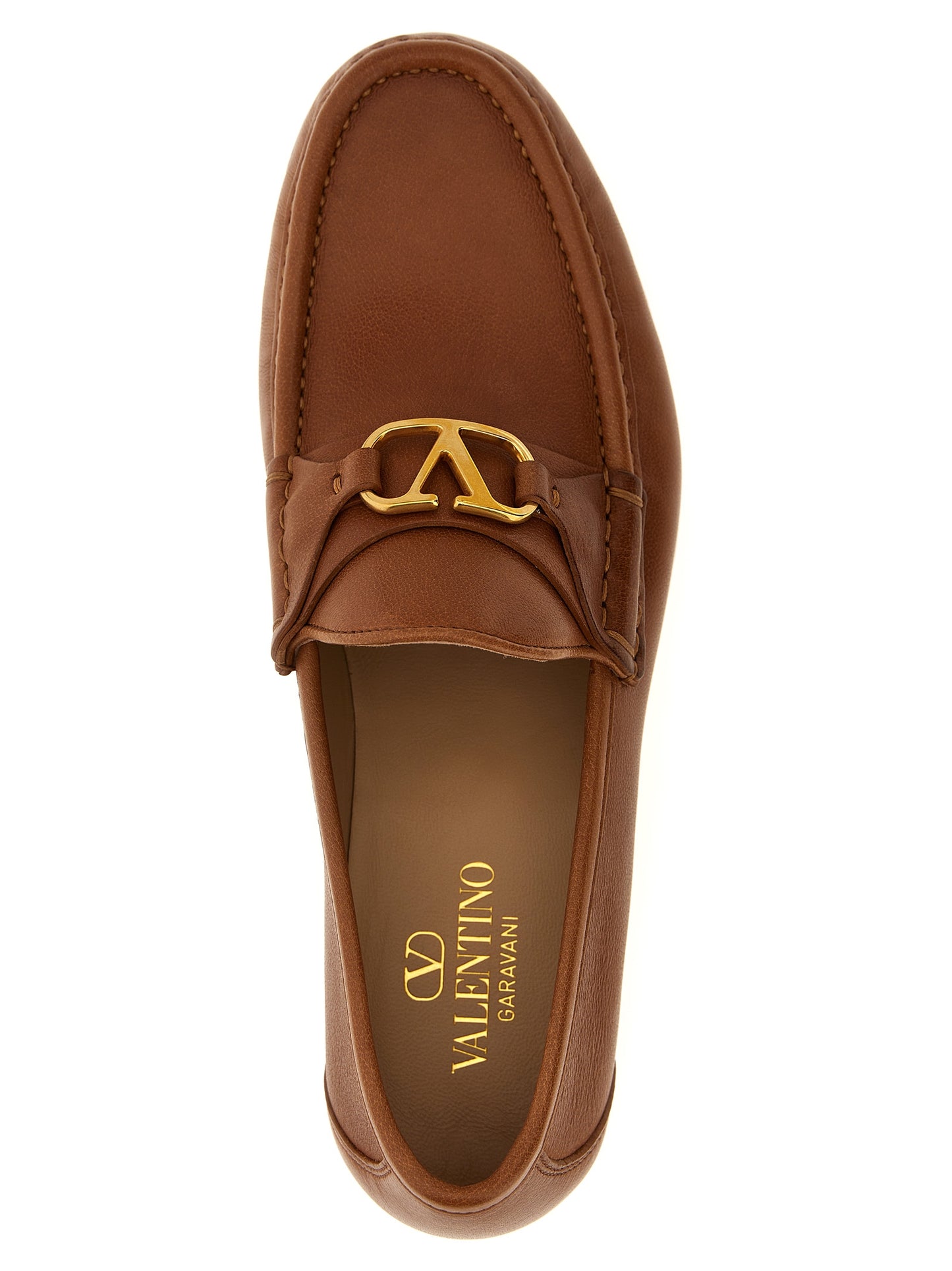 Loafer Slip-On Shoes by Valentino Garavani for men in buffalo leather brown & signature features an effortless chic silhouette, showcasing the V Logo Men's Buffalo Leather Loafer Slip-On Shoes design with an effortless chic and a for a effortless chic look.