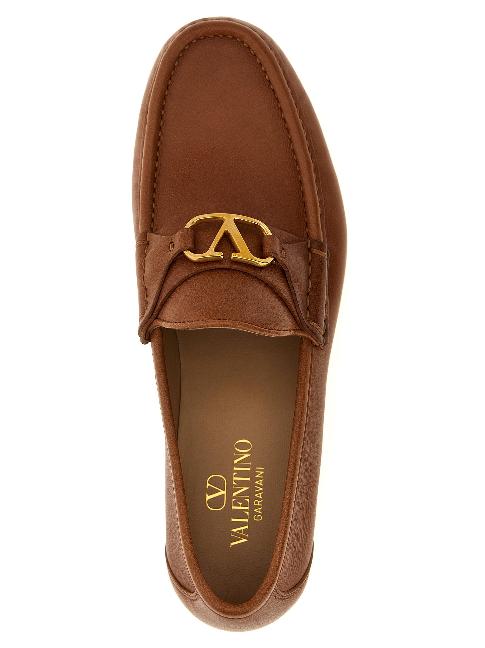 Loafer Slip-On Shoes by Valentino Garavani for men in buffalo leather brown & signature features an effortless chic silhouette, showcasing the V Logo Men's Buffalo Leather Loafer Slip-On Shoes design with an effortless chic and a for a effortless chic look.