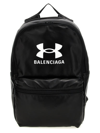 Backpack by Balenciaga for men in polyester & lamb leather bicolour, black, white & print features a utilitarian chic Polyester & Lamb Leather Backpack design with a secure zipper, ample external-pockets, and versatile handle, backpack-strap & adjustable-strap for a utilitarian chic finish.