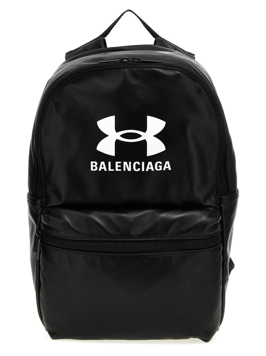 Backpack by Balenciaga for men in polyester & lamb leather bicolour, black, white & print features a utilitarian chic Polyester & Lamb Leather Backpack design with a secure zipper, ample external-pockets, and versatile handle, backpack-strap & adjustable-strap for a utilitarian chic finish.