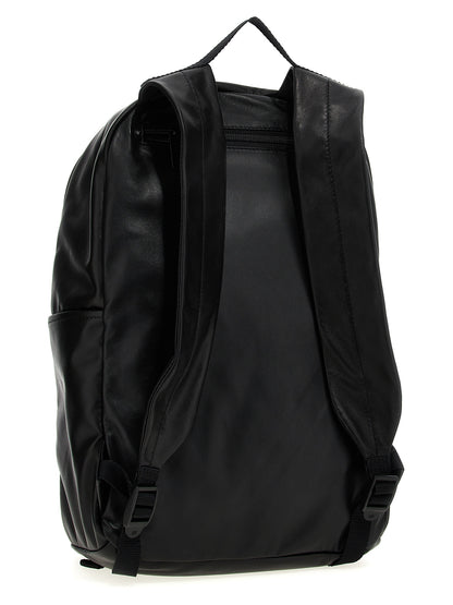 Backpack by Balenciaga for men in polyester & lamb leather bicolour, black, white & print features a effortlessly chic Polyester & Lamb Leather Backpack design, showcasing a secure zipper, ample external-pockets, and versatile handle, backpack-strap & adjustable-strap for a effortlessly chic finish.