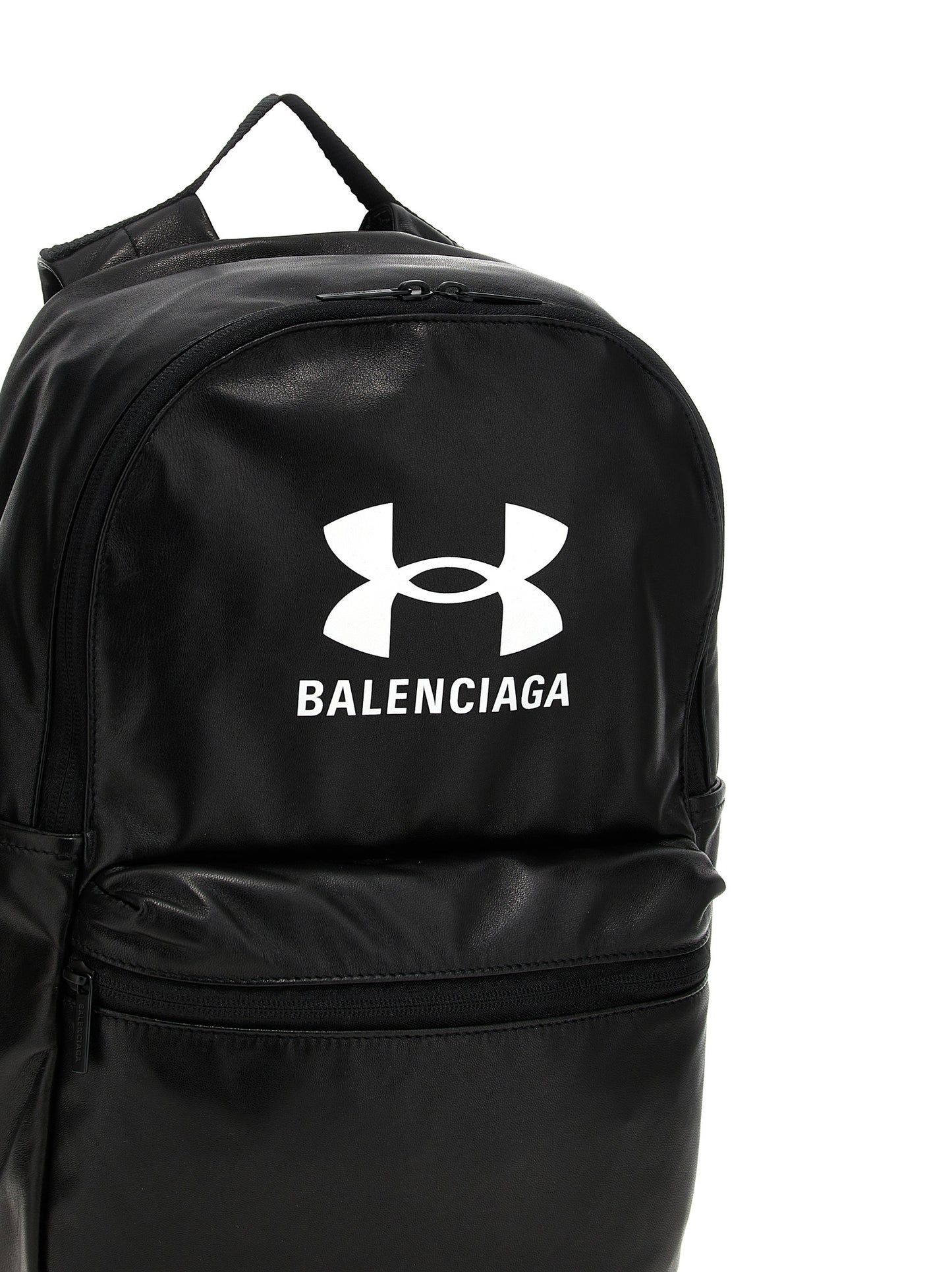 Backpack by Balenciaga for men in polyester & lamb leather bicolour, black, white & print showcases an architectural Polyester & Lamb Leather Backpack design, featuring a secure zipper, ample external-pockets, and architectural handle, backpack-strap & adjustable-strap for a sophisticated look.