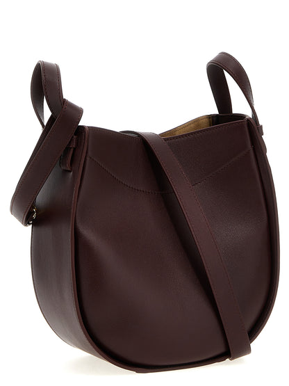 Crossbody Handbag by Loewe for women in calfskin leather bordeaux features an versatile silhouette, showcasing a secure zipper & magnetic and versatile with versatile crossbody-strap, shoulder-strap & adjustable-strap for a versatile finish.