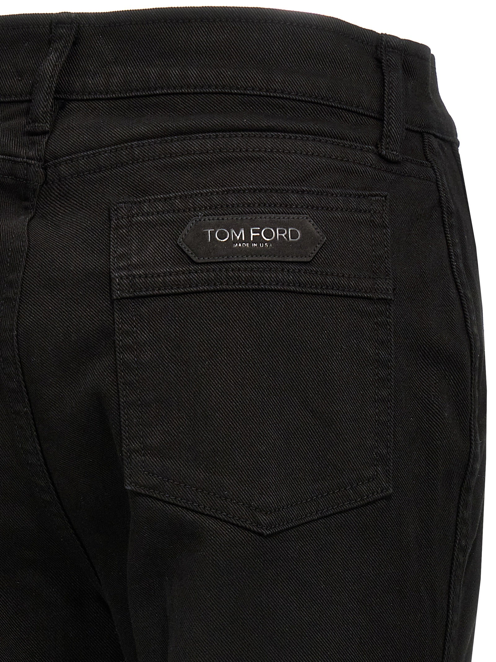 Jeans by Tom Ford for women in stretch denim cotton twill & suede leather black & signature features an sophisticated and flared & wide with a precise long, creating a sophisticated and sophisticated silhouette.