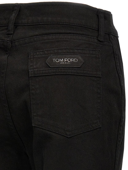 Jeans by Tom Ford for women in stretch denim cotton twill & suede leather black & signature features an sophisticated and flared & wide with a precise long, creating a sophisticated and sophisticated silhouette.
