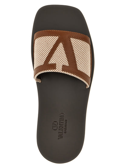 This Flat Shoes by Valentino Garavani for men in cotton canvas & leather brown & signature features an exquisite silhouette from the V Logo Men's Cotton Canvas & Leather Flat Shoes collection, defined by a sophisticated flat and elegant .