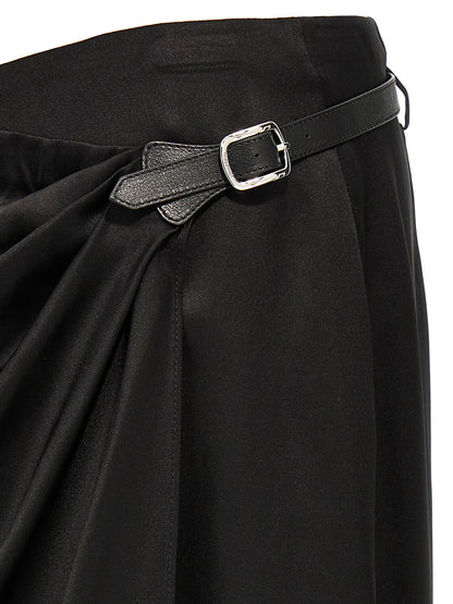 Skirt by Tom Ford for women in satin silk & leather black features a captivating silhouette, showcasing the captivating Women's Wrap Satin Silk & Leather Skirt design with a sophisticated mini for a captivating look.