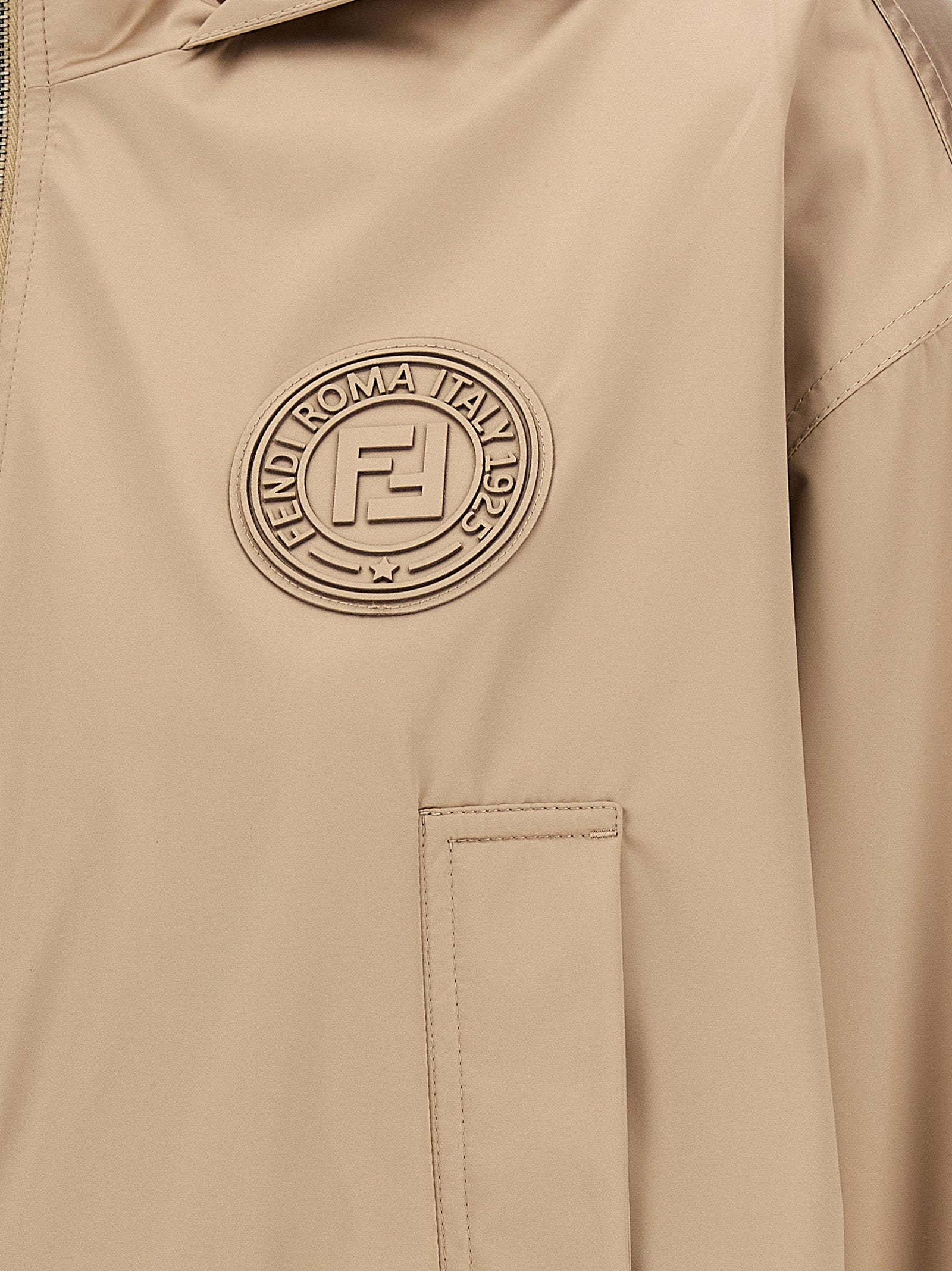 Hooded Windbreaker Jacket by Fendi for women in polyester & silk brown & jacquard showcases a urban chic silhouette, detailed with a urban chic and functional pockets, hooded & windproof for a polished finish.