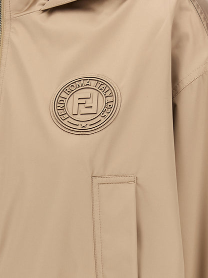 Hooded Windbreaker Jacket by Fendi for women in polyester & silk brown & jacquard showcases a urban chic silhouette, detailed with a urban chic and functional pockets, hooded & windproof for a polished finish.