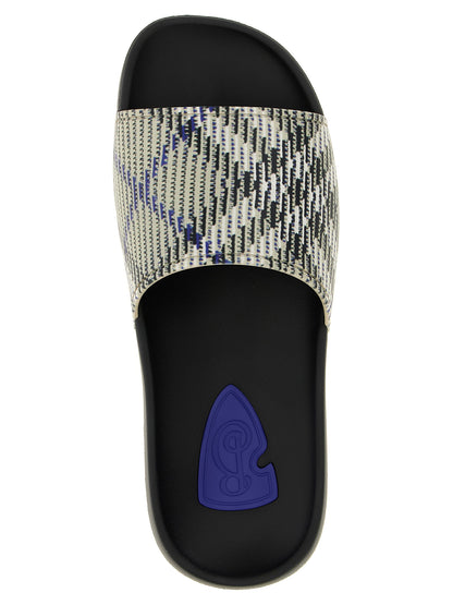 Flat Shoes by Burberry for men in eva tu & polyurethane multicolor showcases a timeless silhouette from the Men's EVA TU & Polyurethane Flat Shoes collection, featuring a timeless flat and for a timeless finish.