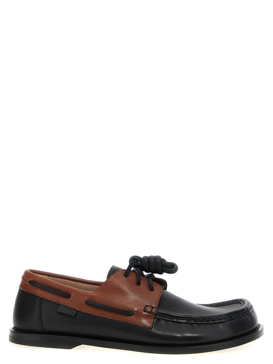 This Boat Loafer Slip-On Lace-Up Shoes by Loewe for men in bos taurus calfskin leather multicolor features an exquisite silhouette from the Men's Bos Taurus Calfskin Leather Boat Loafer Slip-On Lace-Up Shoes collection, defined by a sophisticated and elegant .