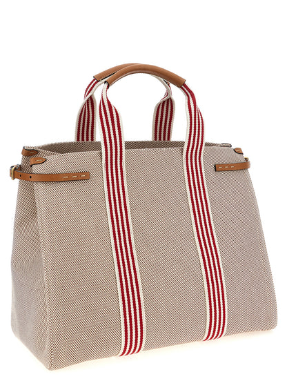 Handbag by Valentino Garavani for unisex in cotton & leather multicolor & signature features a signature silhouette, showcasing a secure magnetic and signature with versatile adjustable-strap & handle for a sophisticated look.