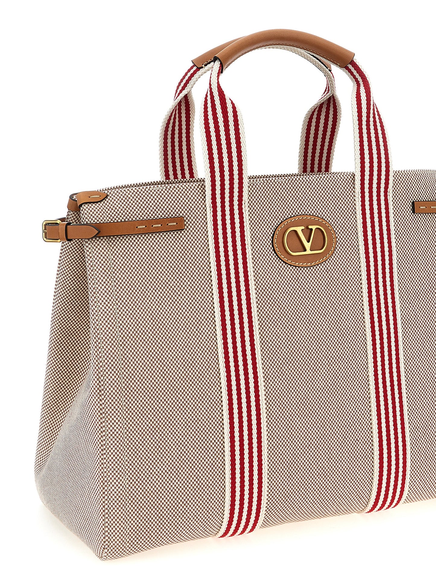 Handbag by Valentino Garavani for unisex in cotton & leather multicolor & signature presents a ornamental silhouette, showcasing a secure magnetic, ample , and versatile adjustable-strap & handle for a ornamental finish.