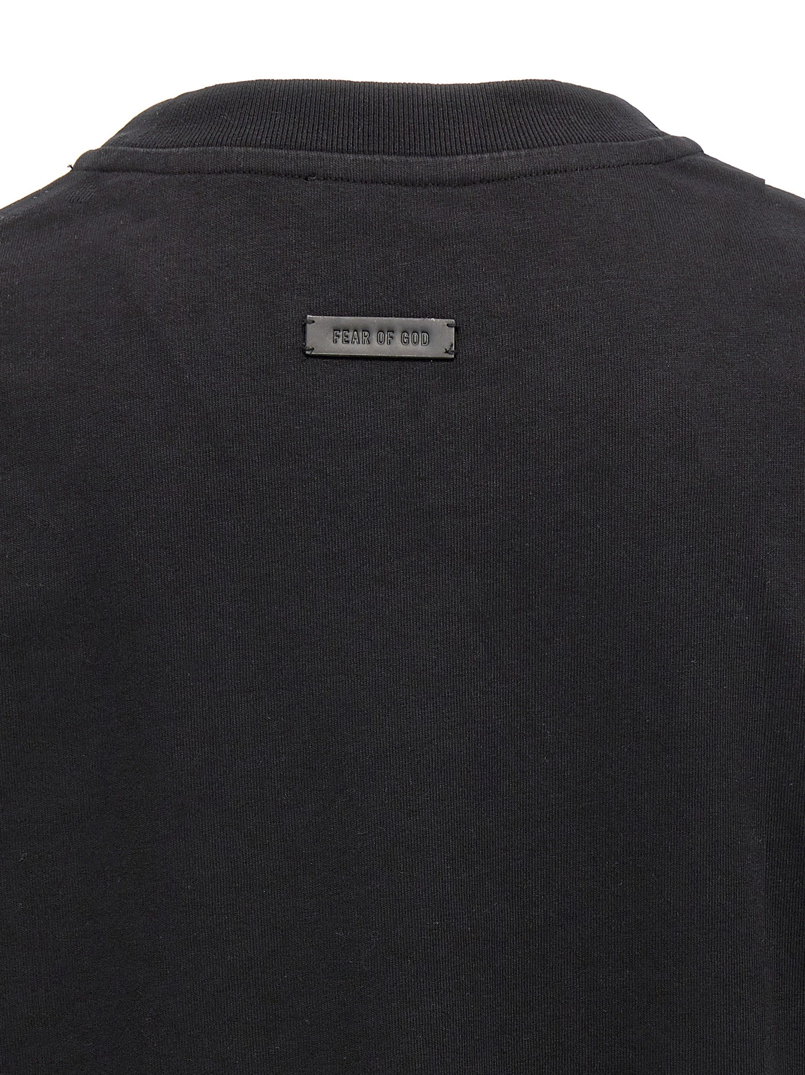T-Shirt by Fear Of God for men in leather & cotton black features an edgy silhouette, meticulously detailed with a sophisticated and for a truly edgy finish.