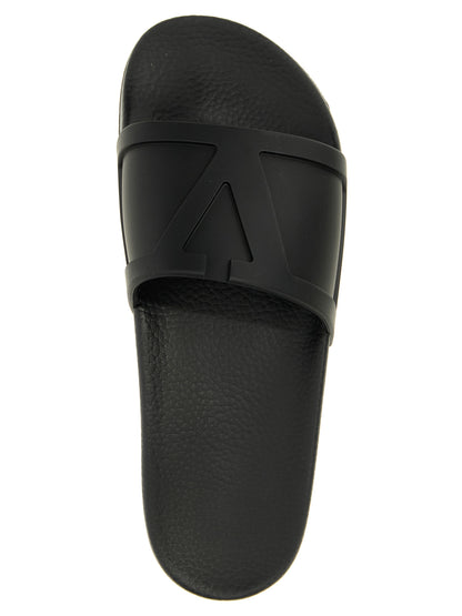 Flat Shoes by Valentino Garavani for men in plastic black, signature-print & print showcases a timeless silhouette from the V Logo Men's Plastic Flat Shoes collection, featuring a timeless flat and for a timeless finish.