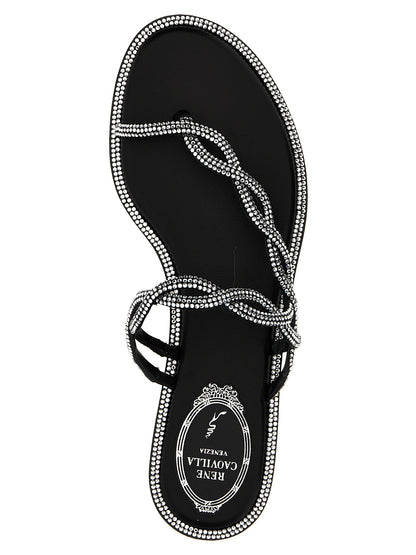 Sliders Sandals Flat Shoes by RENE CAOVILLA for women in leather & rhinestone black & signature presents a effortless chic silhouette, showcasing the Women's Leather & Rhinestone Sliders Sandals Flat Shoes design with a effortless chic and for a sophisticated look.