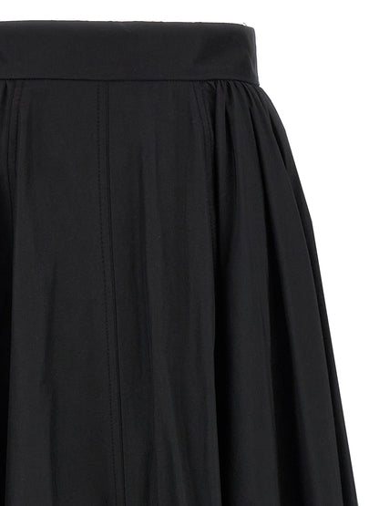 Skirt by The Andamane for women in cotton polyester black showcases a sultry silhouette, elegantly defined by its mini and the sophisticated sultry design of the Women's Cotton Polyester Skirt.
