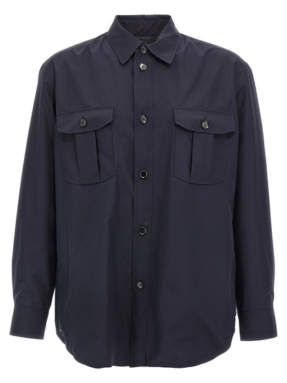 Jacket by Brioni for men in silk blue showcases a contemporary silhouette, detailed with a contemporary wrap shirt-collar neckline and premium pockets for a sophisticated finish.