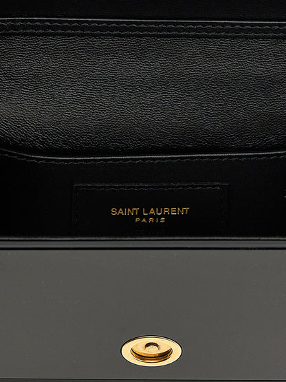 Crossbody Evening Flap Handbag by Saint Laurent for women in wool plastic suede leather & plexiglass black features a multifaceted silhouette, showcasing a secure flap & magnetic and multifaceted with versatile crossbody-strap, shoulder-strap & detachable-strap for multifaceted style.