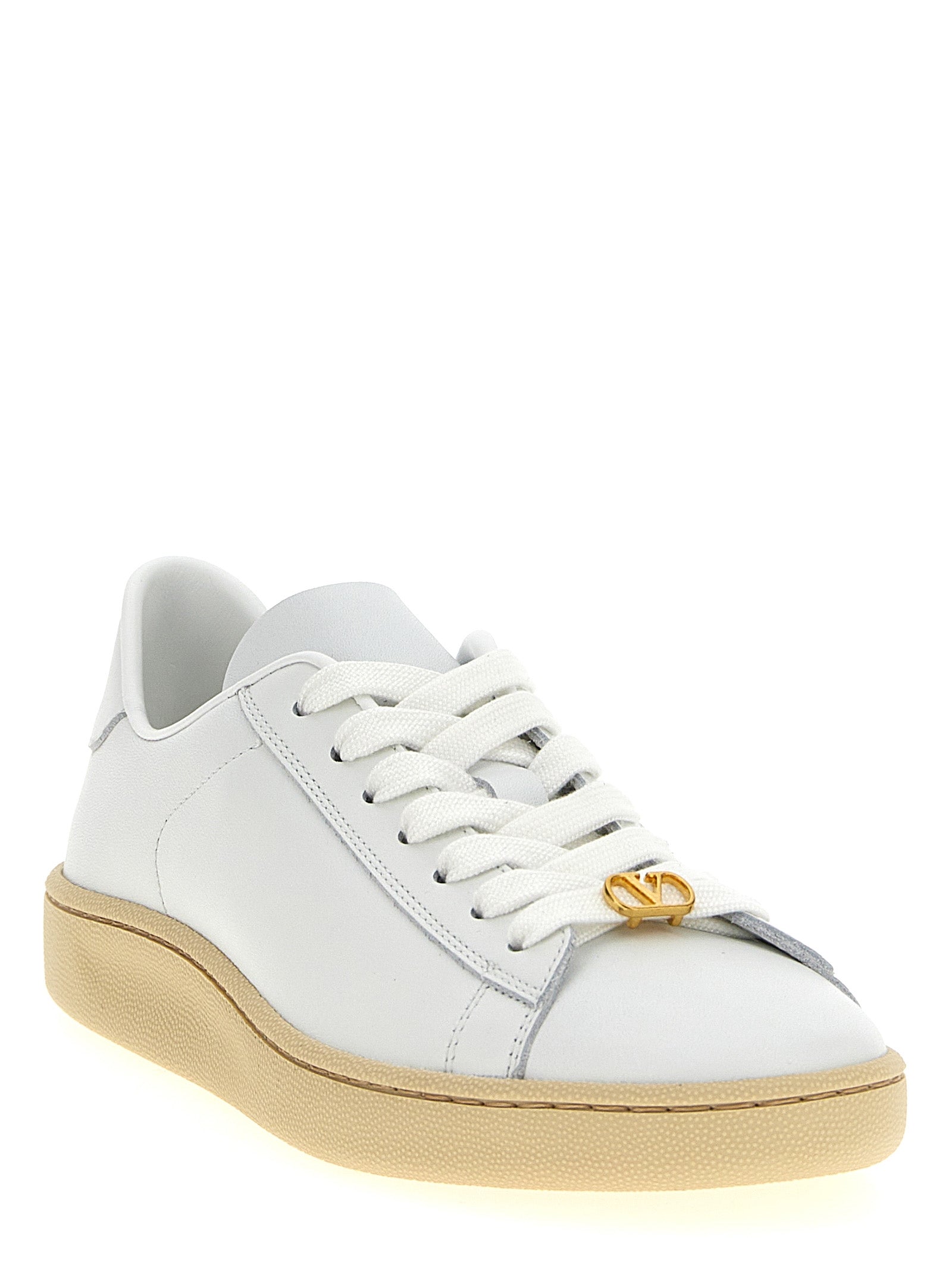 Sneakers by Valentino Garavani for women in calfskin leather white & signature presents a impeccable silhouette as V Logo Women's Low Top Calfskin Leather Sneakers, expertly defined by a impeccable low-top style for a impeccable, high-fashion look.