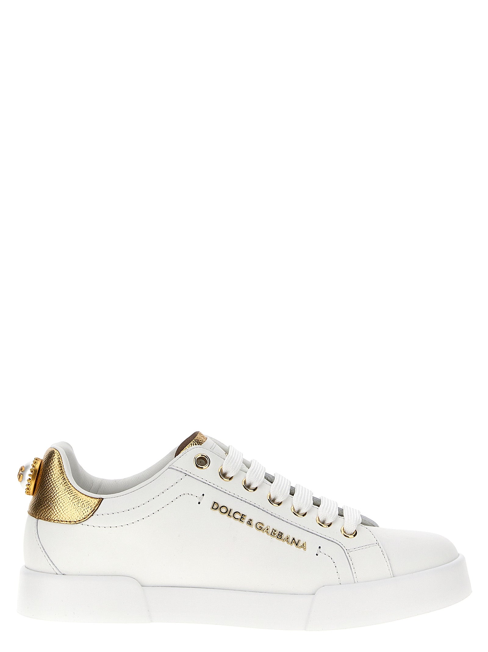 Sneakers by Dolce & Gabbana for women in calfskin leather gold & pearl features an versatile design from the Women's Low Top Calfskin Leather Sneakers collection, highlighting a versatile low-top style for a premium, high-fashion look.